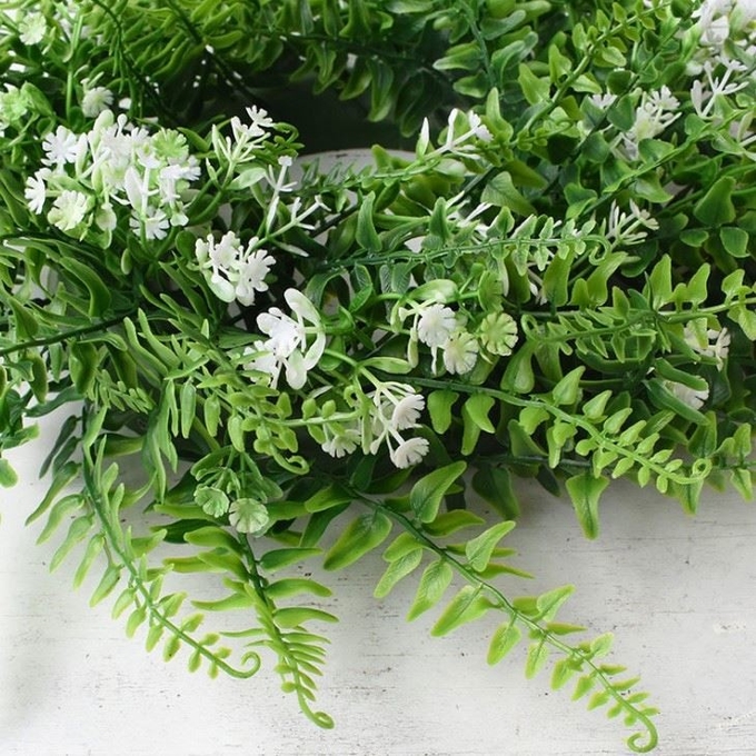 O falso por atacado folheia festão artificial do eucalipto das plantas das folhas decorativas